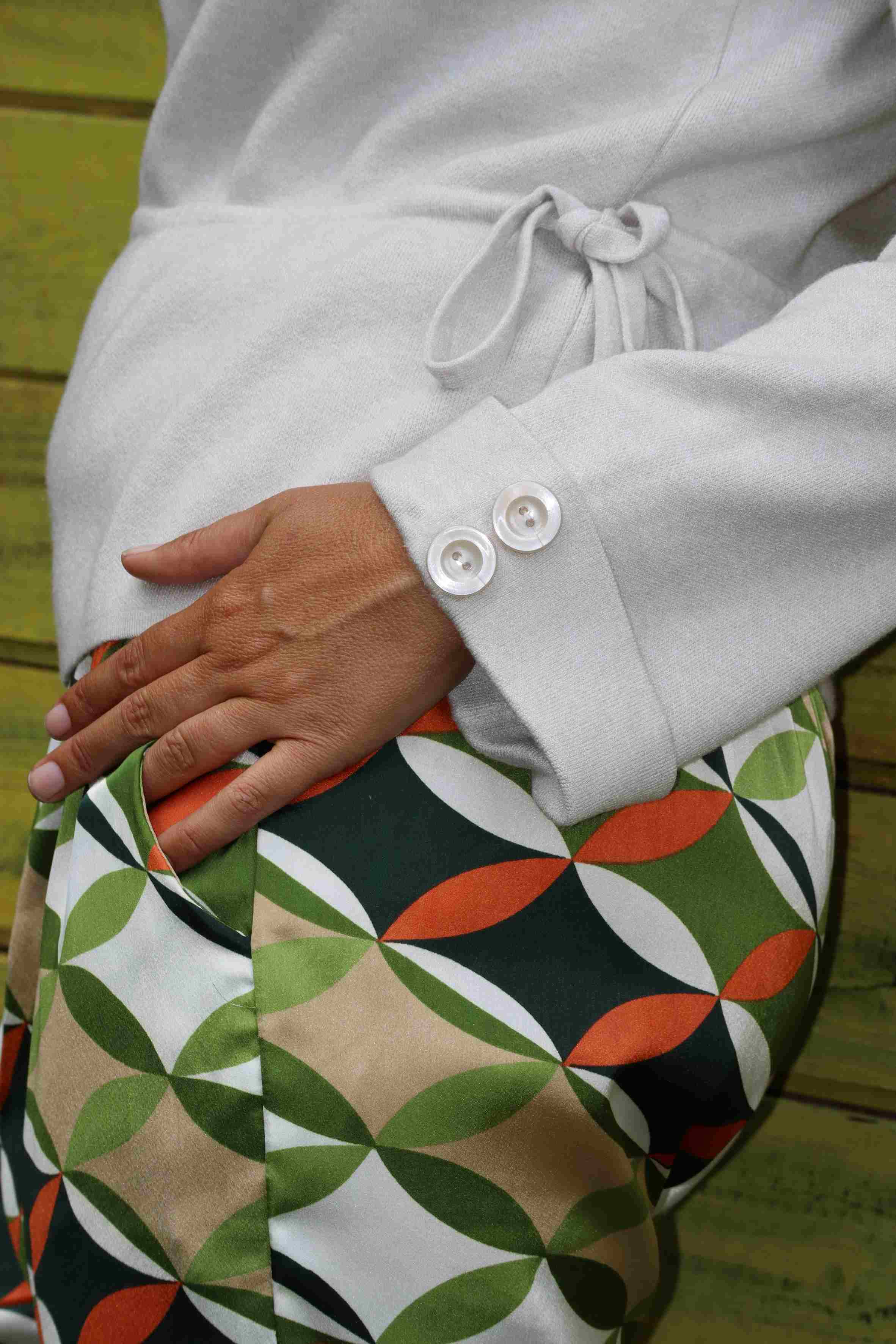 Soft, creamy, vanilla-colored (viscose) sweater.