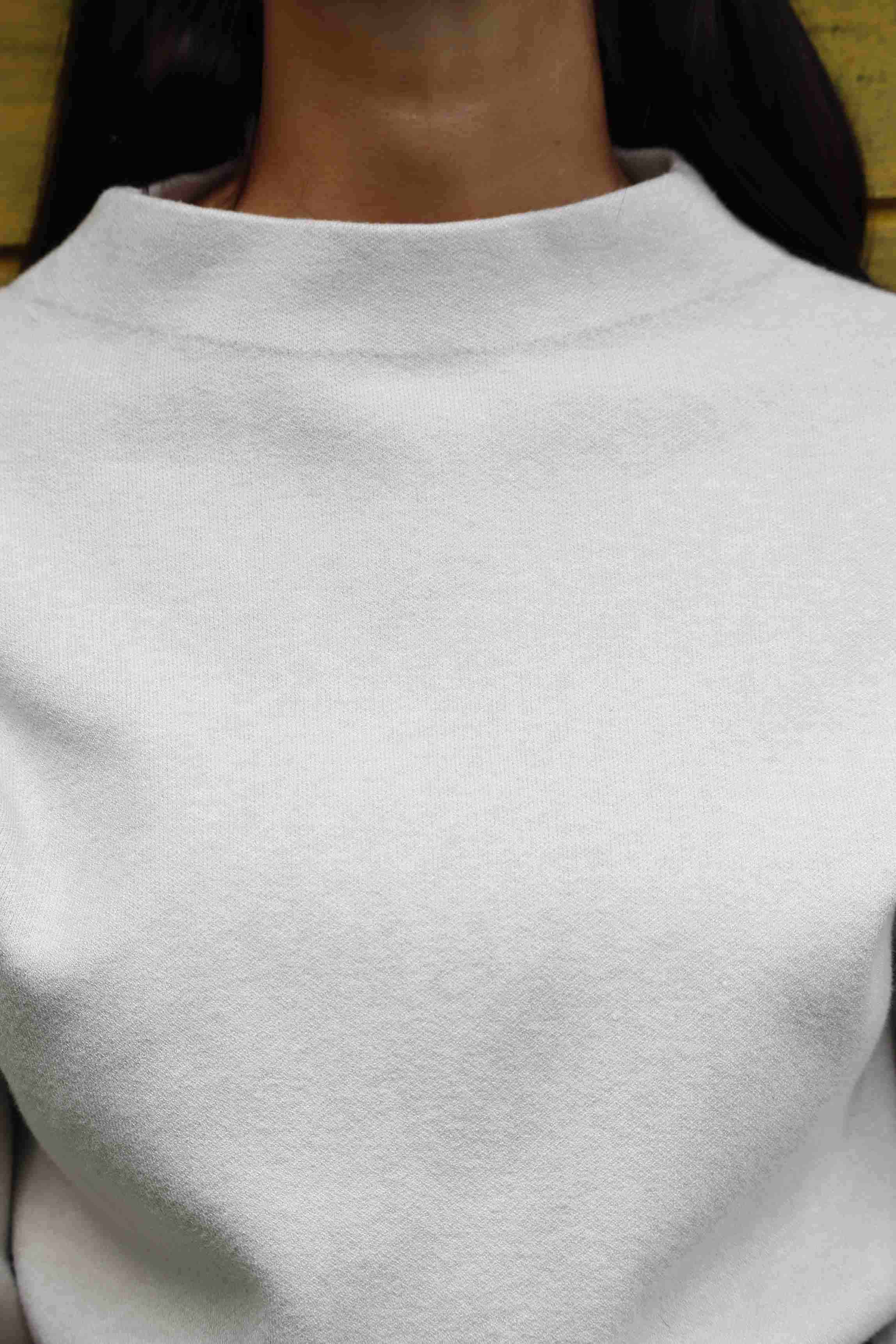 Soft, creamy, vanilla-colored (viscose) sweater.