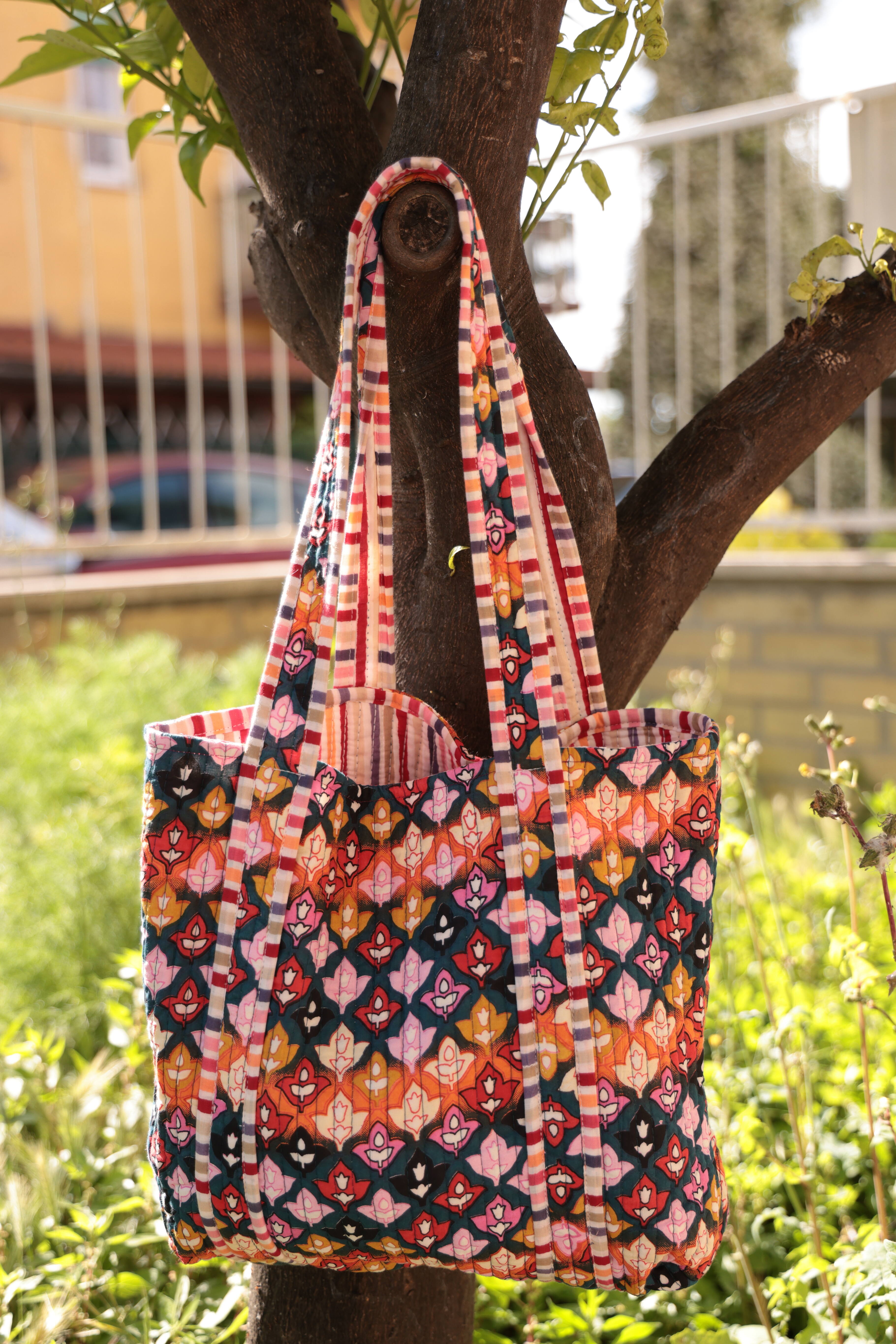Borsa giglio trapuntata e double face multicolor 