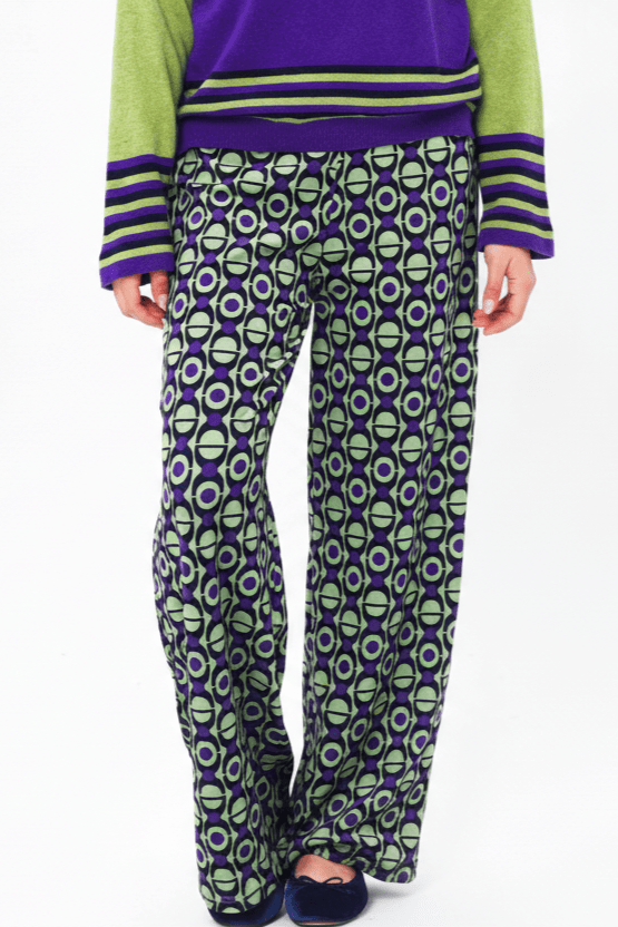 Pantalone velluto elasticizzato con stampa geometrica viola e pistacchio