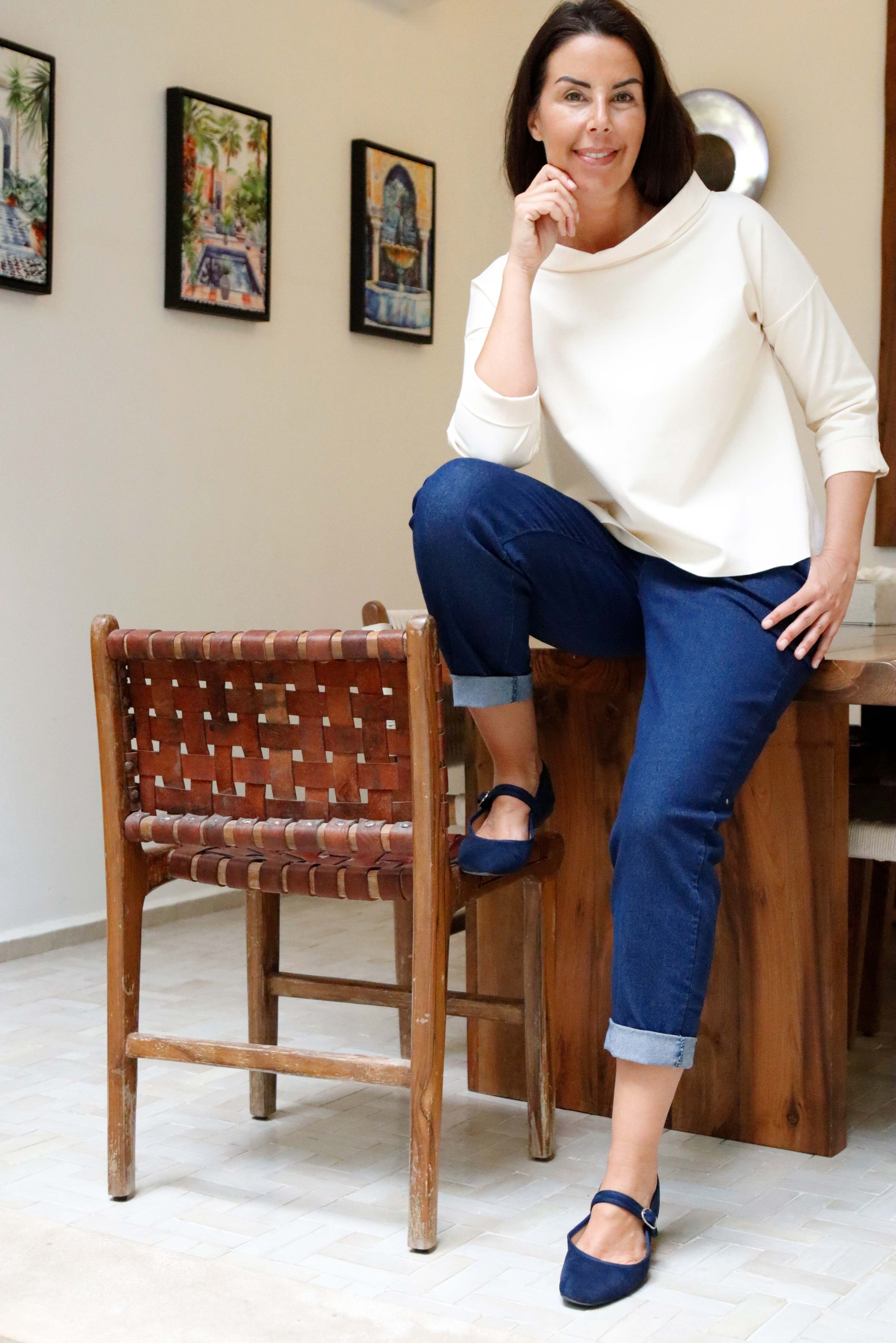 Blusa punto milano colore panna con collo a vulcano