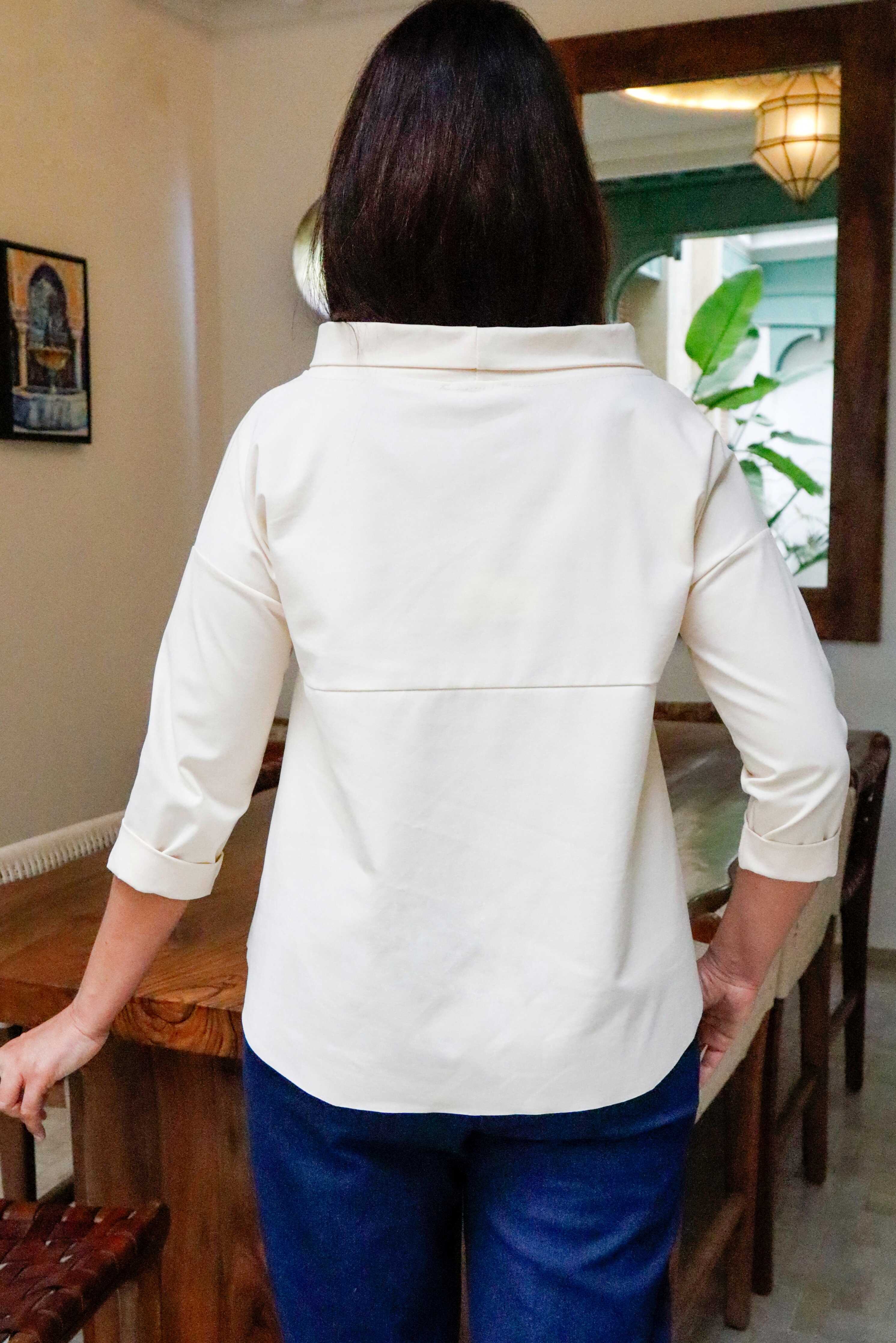 Blusa punto milano colore panna con collo a vulcano